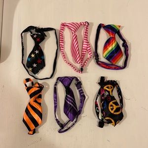 New, set of ties for your fur baby! You get a total of 6 multi colored ties